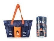 Packs beach bag and towel