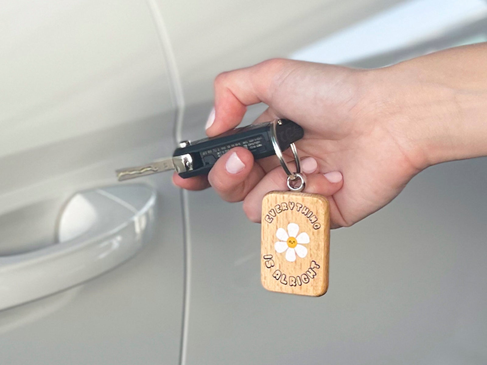 Llavero de madera margarita