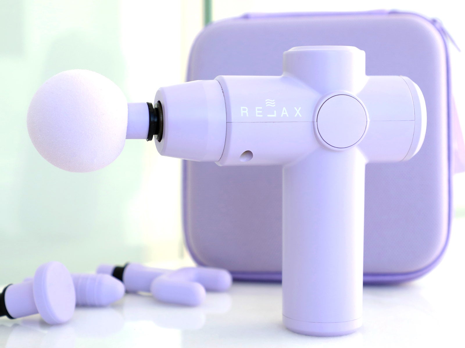 Pistola de masaje muscular digital Lila