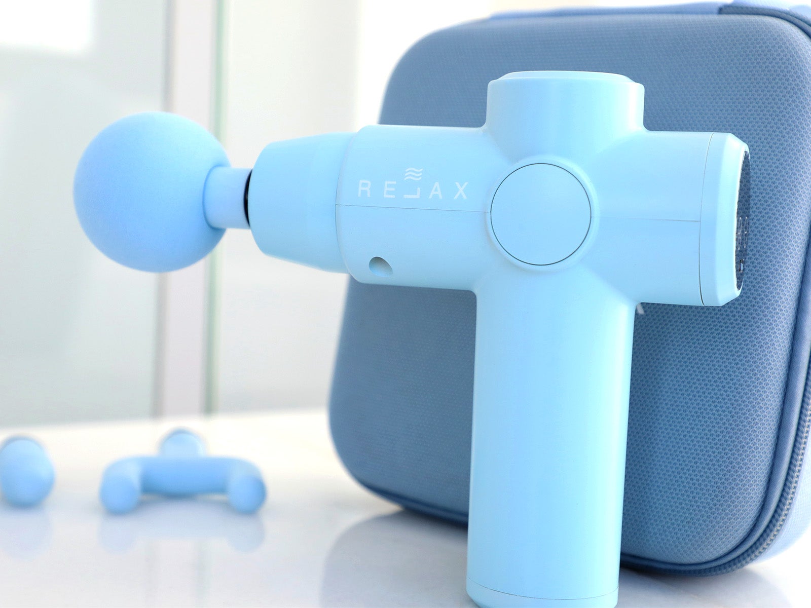 Pistola de masaje muscular digital azul - RELAX