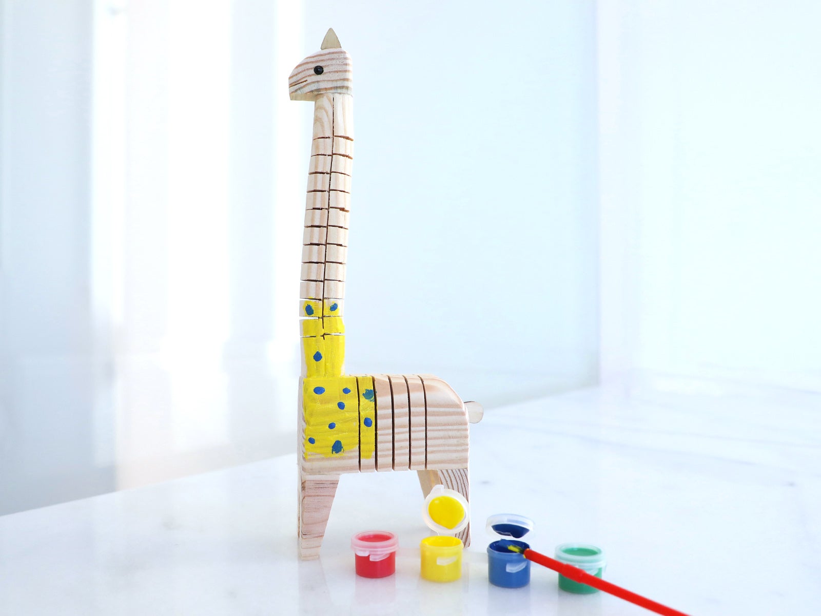 Jirafa de madera articulada para pintar