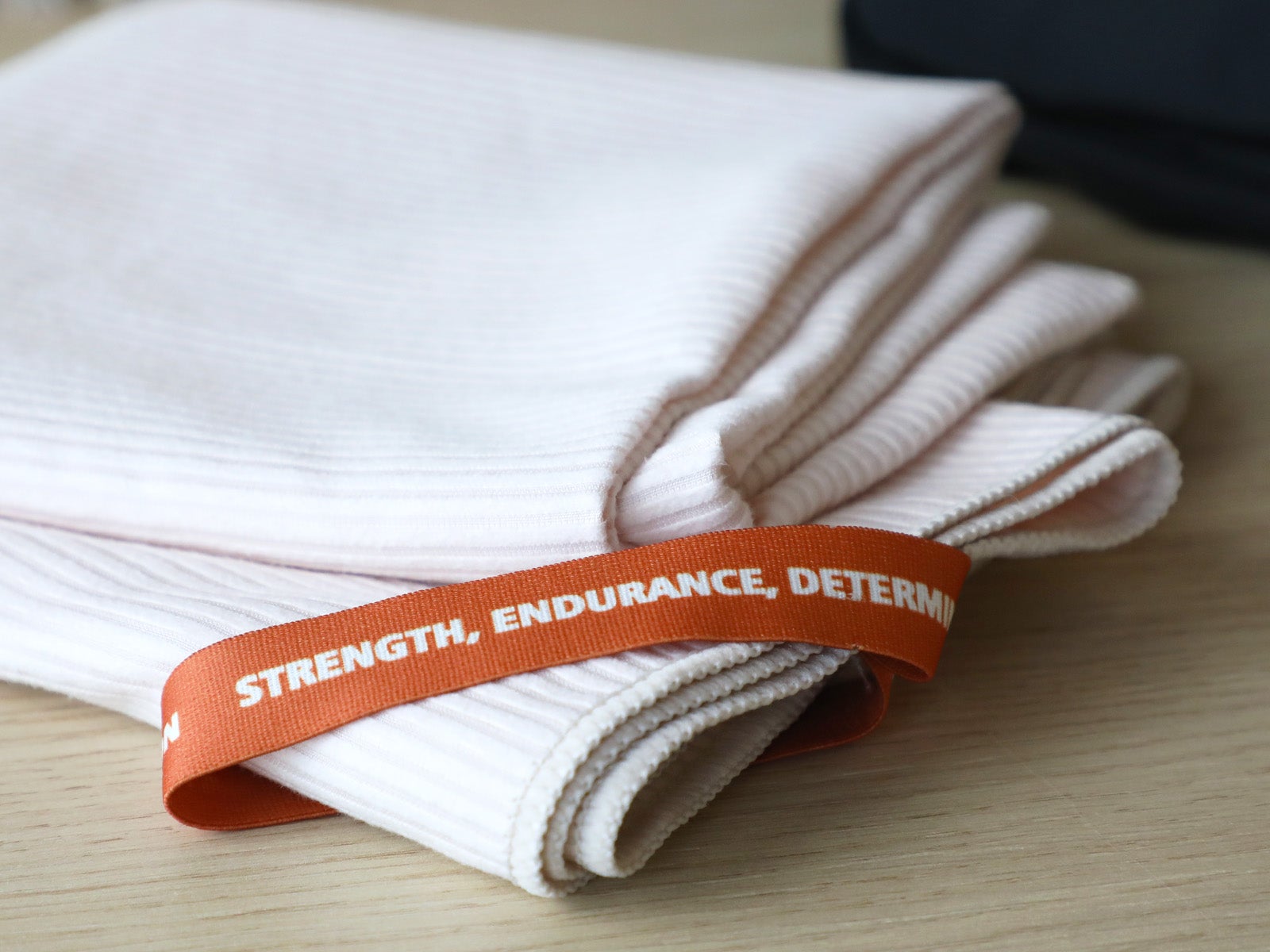 Foldable towel with gray elastic