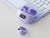 Auriculares inalámbricos lilas modo clip
