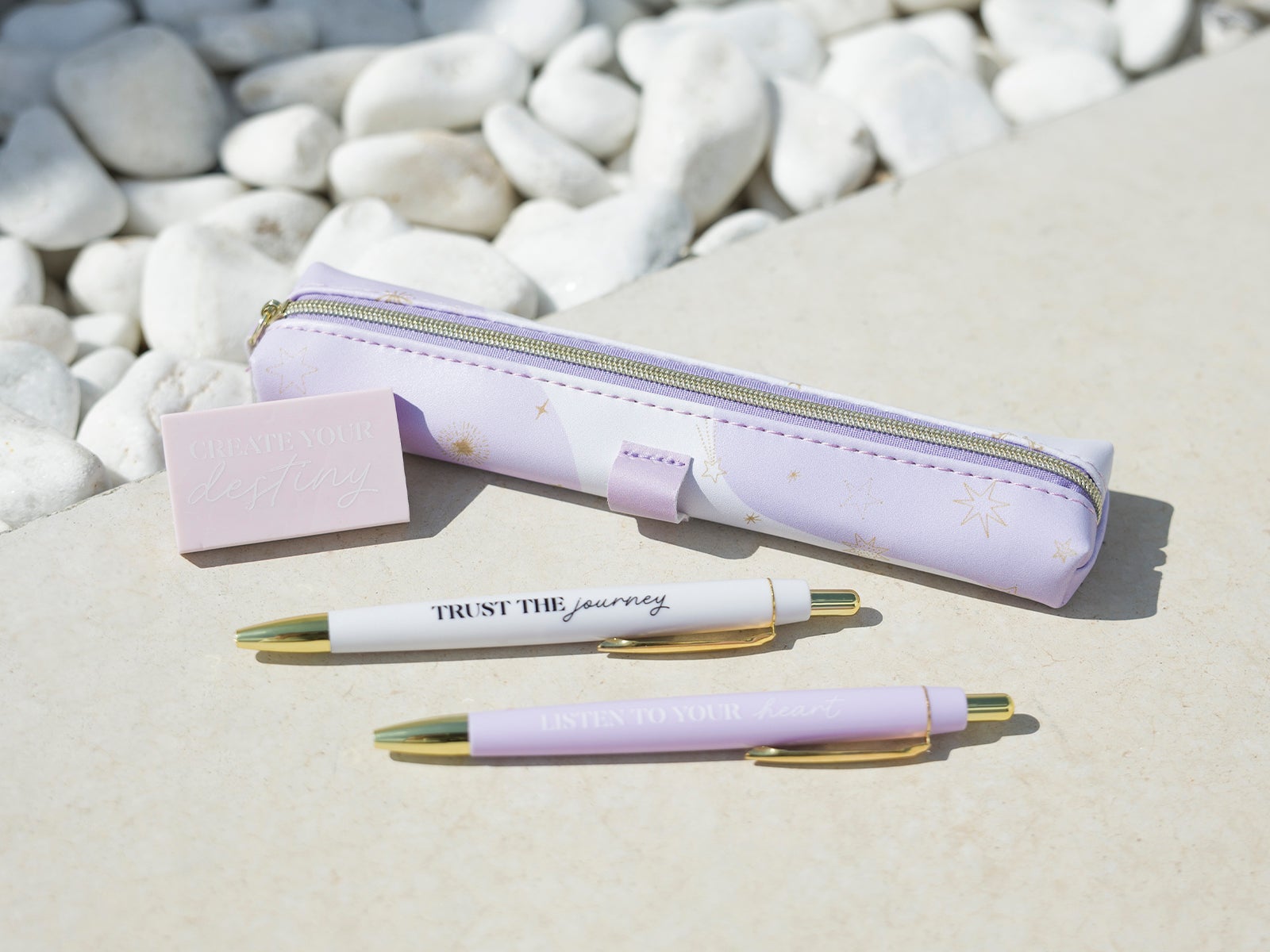 Set de estuche, goma y dos bolis morado