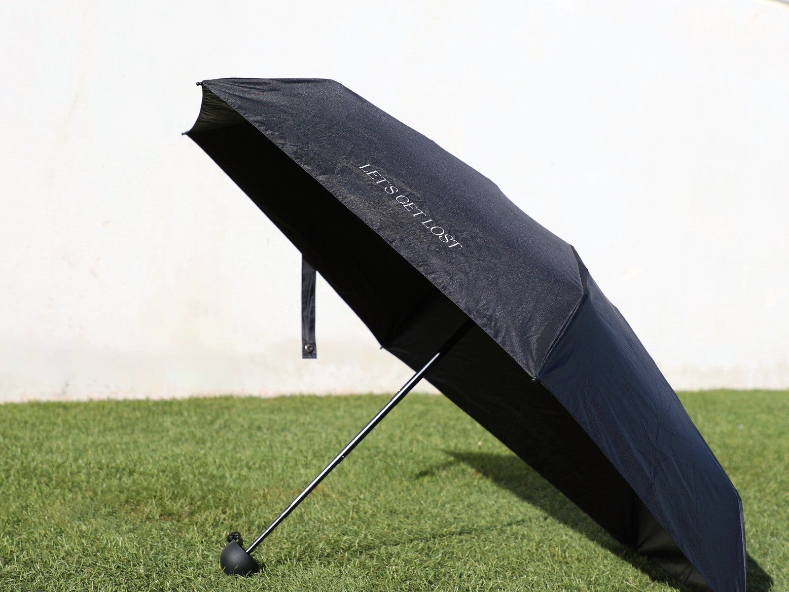 Paraguas mini negro con filtro +50 UV – Let’s get lost
