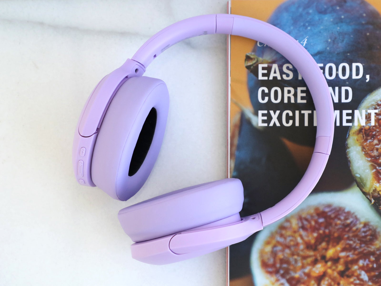 Auriculares de diadema con cancelación de ruido lila