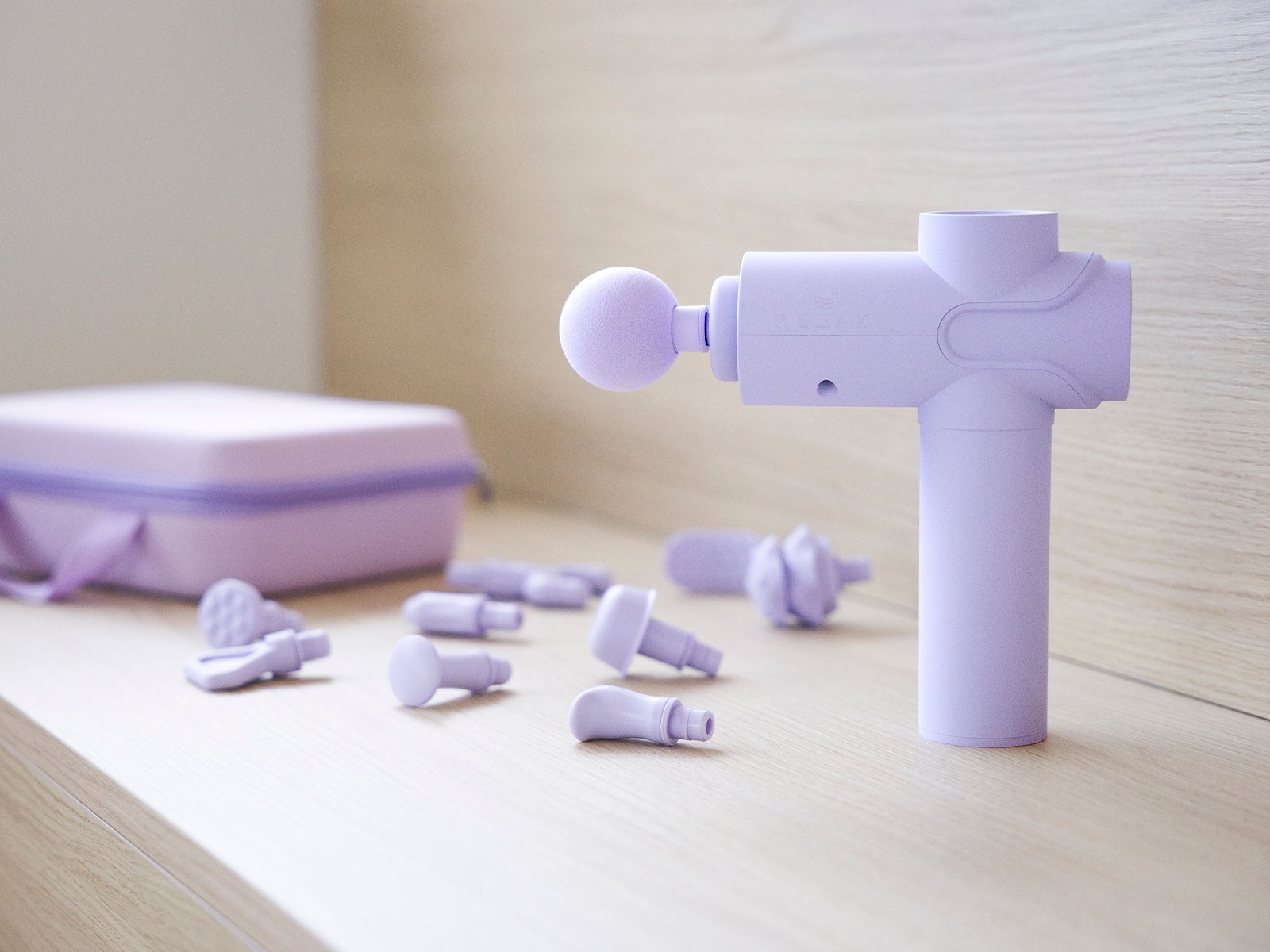 Pistola de masaje muscular digital lila con 10 cabezales - RELAX