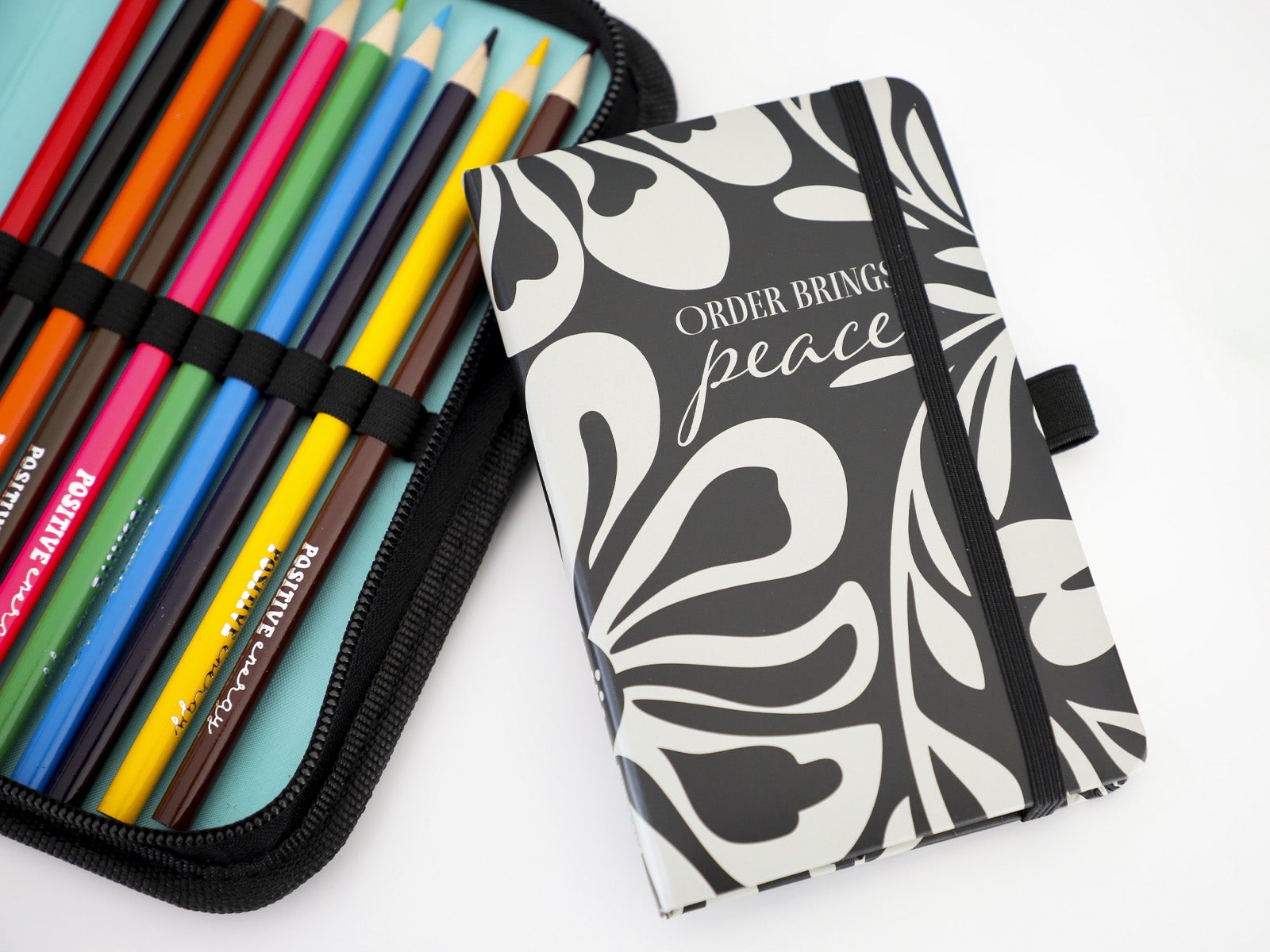 A6 Notebook - Order brings peace