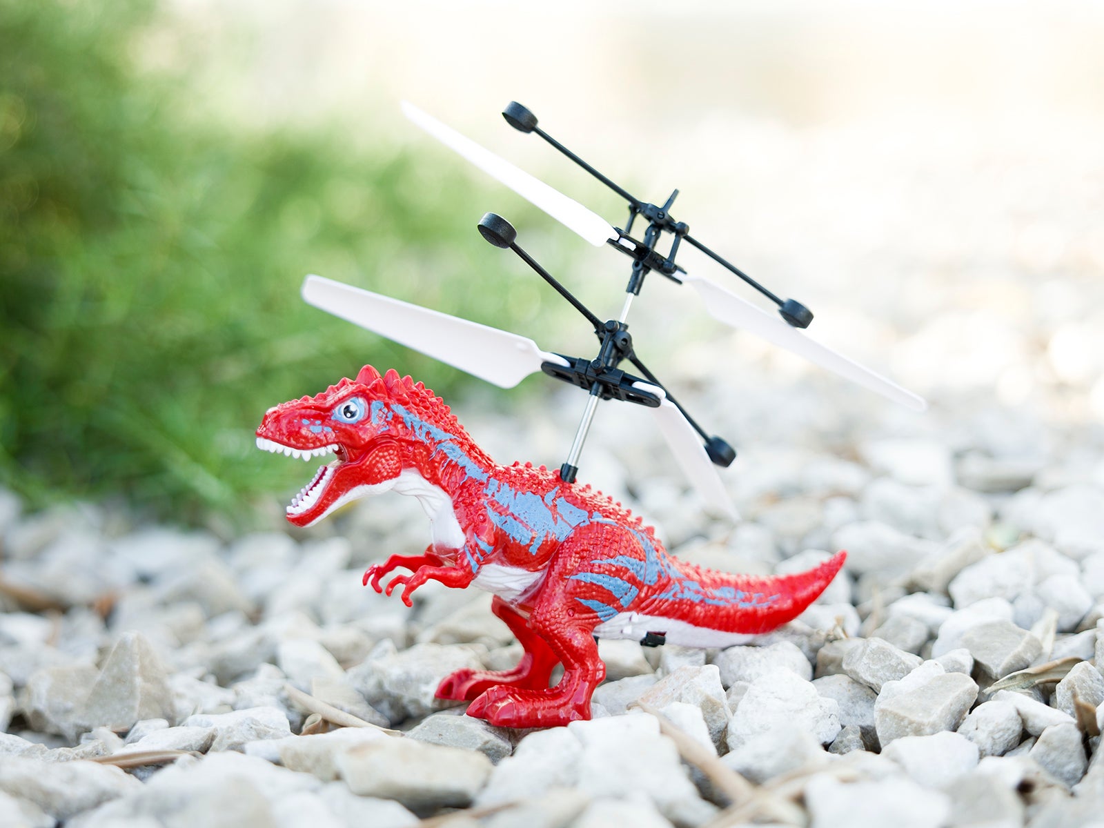 Juguete dinosaurio volador marrón