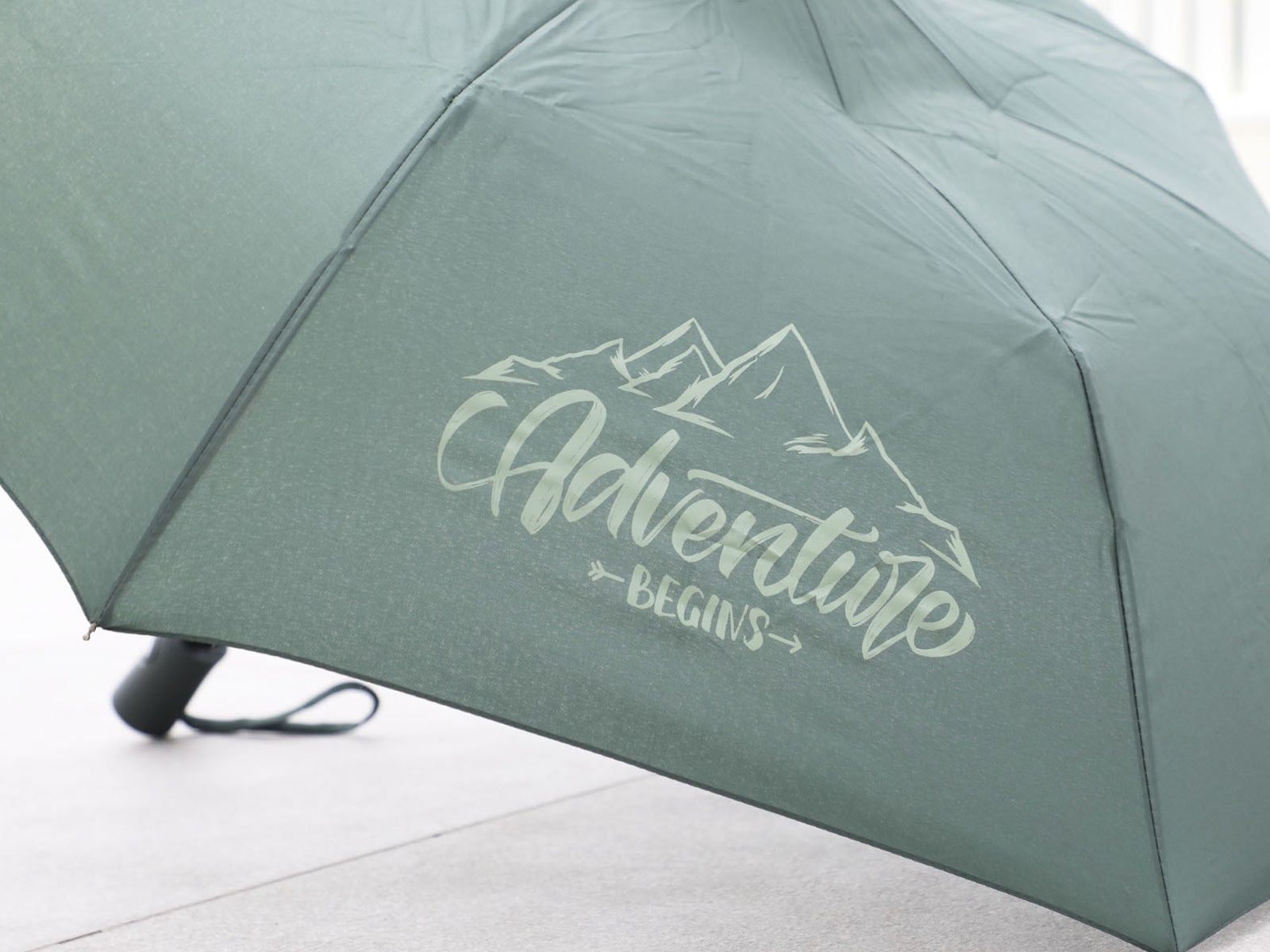 Paraguas plegable verde – Adventure begins