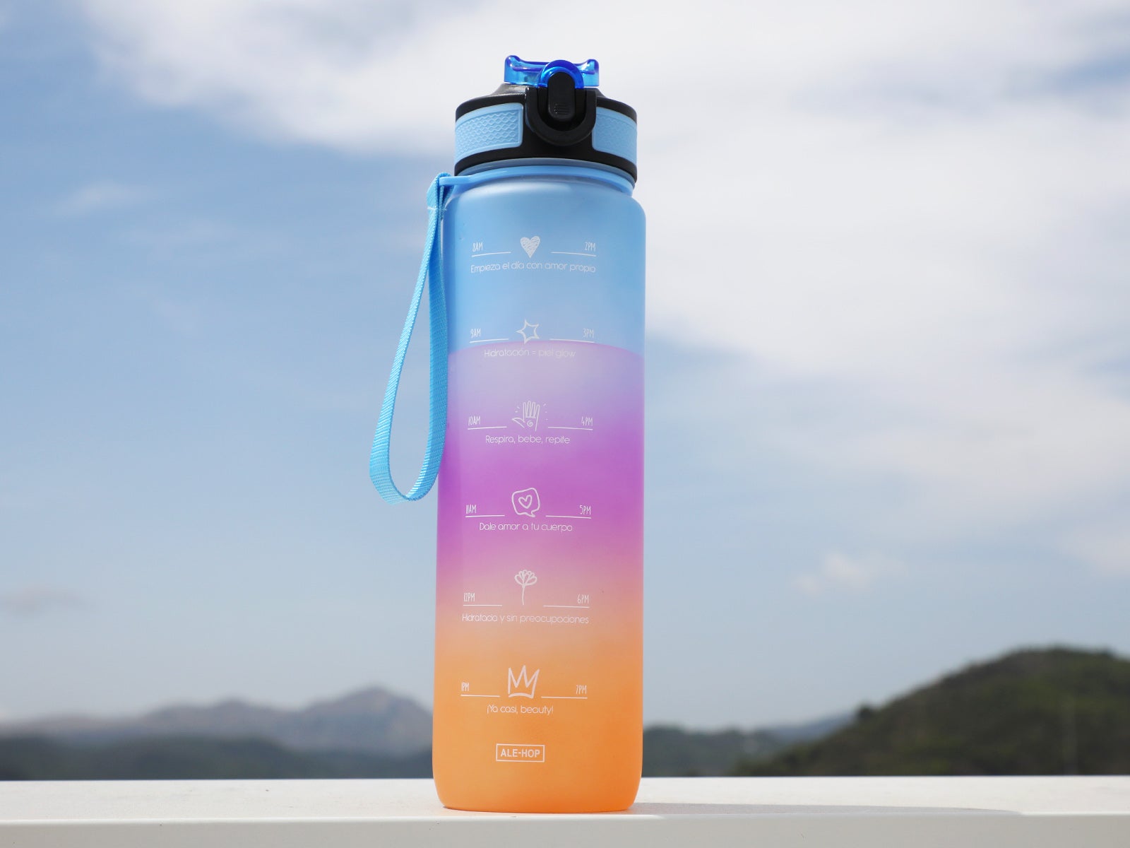 Botella con mensajes motivacionales multicolor 1L